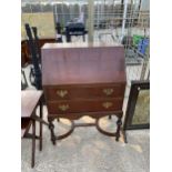 A MID 20TH CENTURY MAHOGANY BUREAU ON OPEN BASE, 27" WIDE