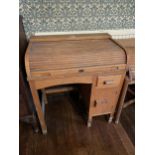 A CHILD'S PINE ROLL TOP DESK