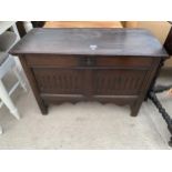 A 17TH CENTURY OAK BLANKET CHEST WITH TWO CARVED PANELS, 36" WIDE