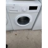 A WHITE LOGIK WASHING MACHINE