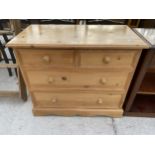 A MODERN PINE CHEST OF TWO SHORT AND TWO LONG DRAWERS, 35.5" WIDE