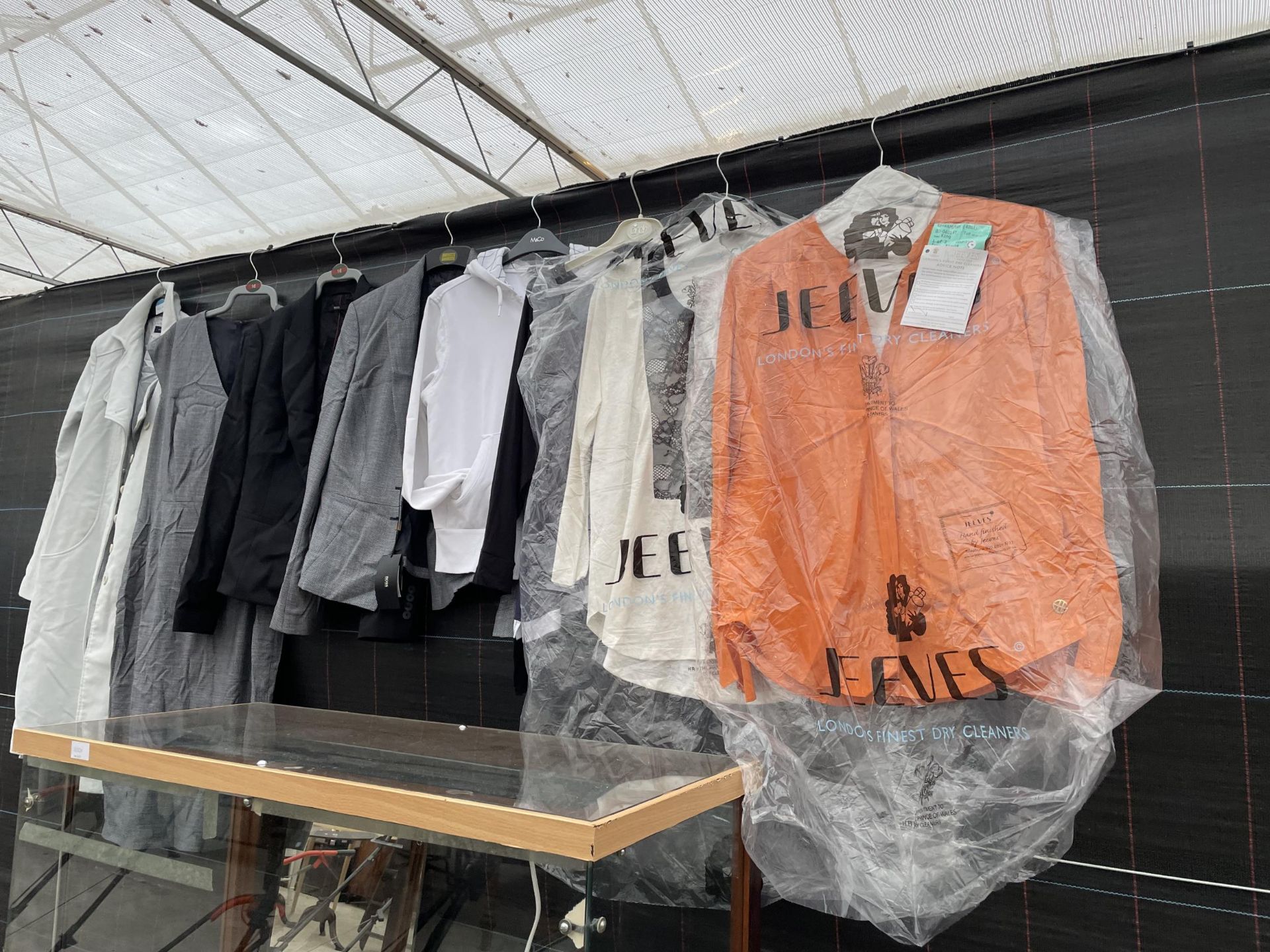 AN ASSORTMENT OF LADIES CLOTHING TO INCLUDE HUGO BOSS AND FRENCH CONNECTION ETC