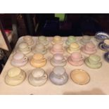 A NUMBER OF LARGE ARCOPAL OPALESCENT TEACUPS AND SAUCERS