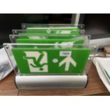 A NUMBER OF EMERGANCY EXIT SIGNS