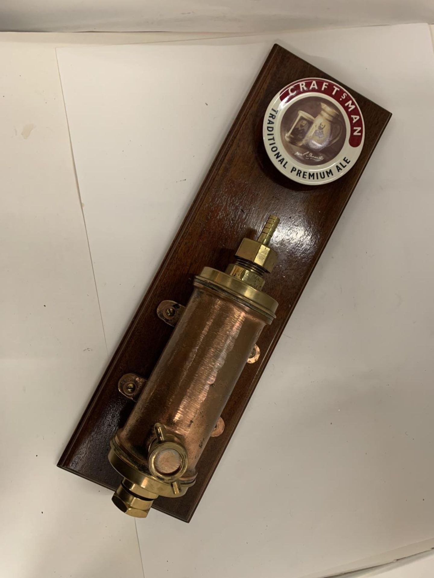 A WOODEN MOUNTED COPPER PUB PUMP ADVERTISING CRAFTSMAN TRADITIONAL PREMIUM ALE