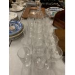 A QUANTITY OF ETCHED GLASSWARE TO INCLUDE WINE GLASSES, TUMBLERS, WHISKEY GLASSES AND A DECANTER
