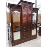A VICTORIAN MAHOGANY BREAKFRONT WARDROBE WITH TWO MIRROR DOORS, FOUR DRAWERS, PAIR GLAZED