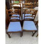 A SET OF FOUR MODERN LADDERBACK DINING CHAIRS