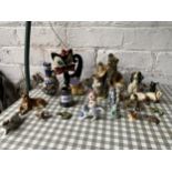 AN ASSORTMENT OF CERAMIC FIGURES TO INCLUDE WADE ANIMALS ETC