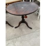AN 18TH CENTURY MAHOGANY TRIPOD TABLE WITH ONE PIECE TOP, 29.5" DIAMETER