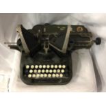 A VINTAGE 'THE OLIVER NO.9' BAT WING TYPEWRITER C 1913