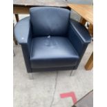 A KUSH CO LEATHER OFFICE EASY CHAIR ON CHROME LEGS WITH BRACKET TO FIT TABLE