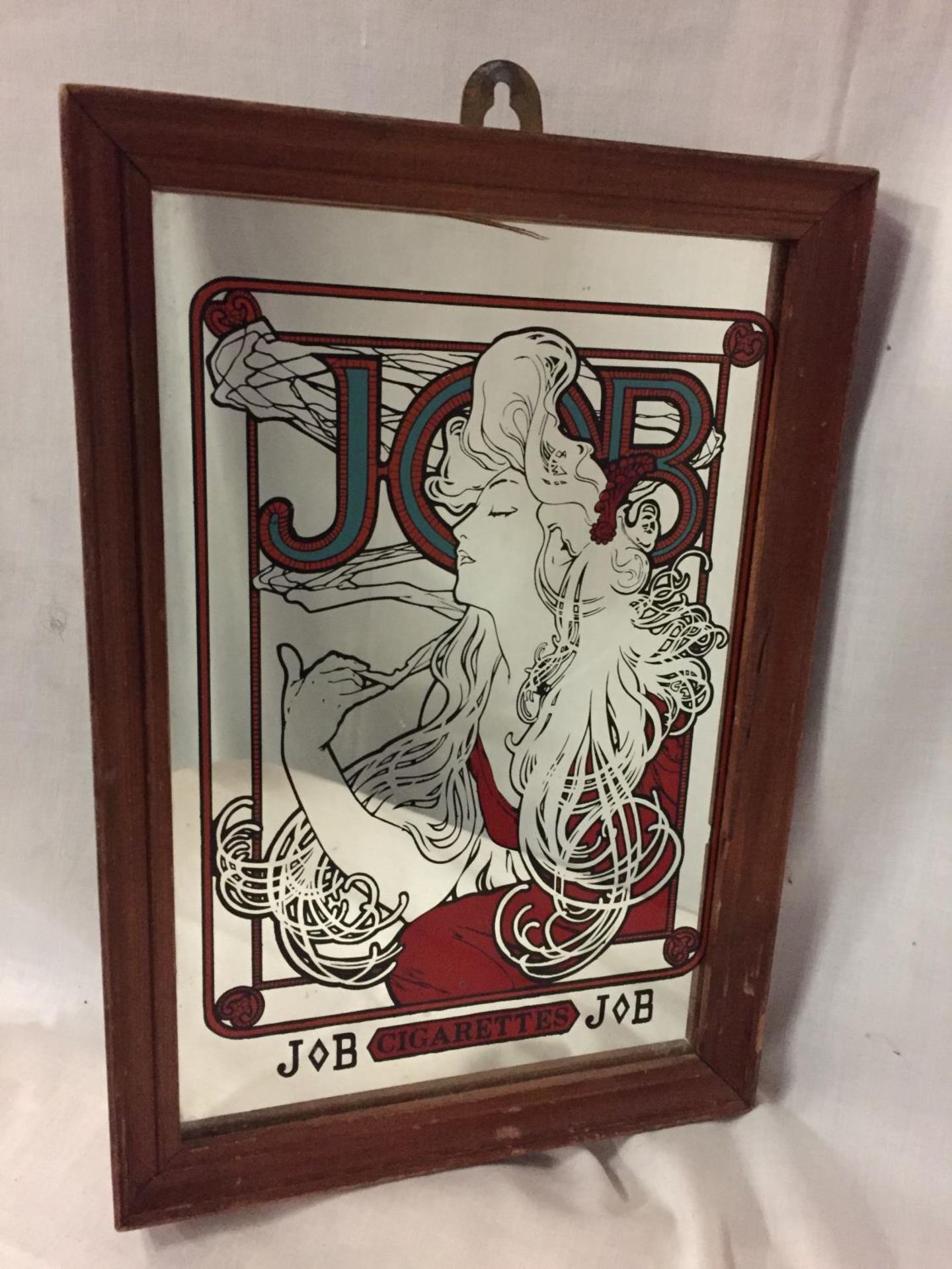 AN ADVERTISING MIRROR FOR J B CIGARETTES