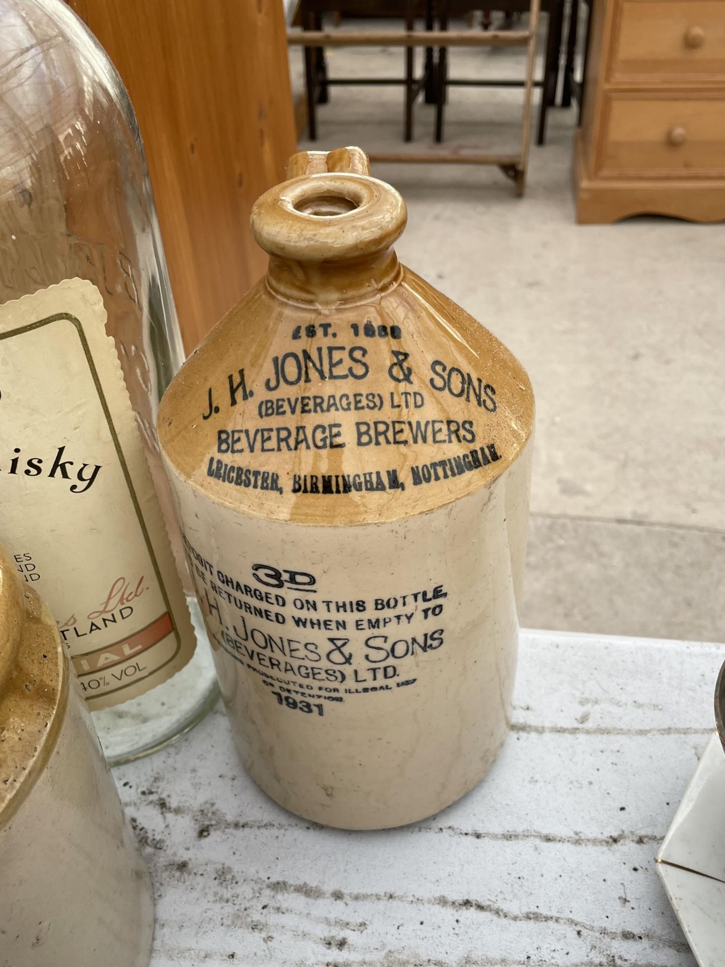 THREE VINTAGE STONEWARE VESSELS, A STONEWARE FLAGGON AND A LARGE BELLS WHISKEY BOTTLE - Image 2 of 2