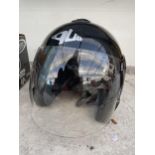 A BLACK MOTORCYCLE HELMET