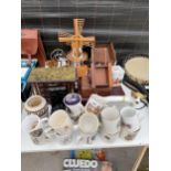 AN ASSORTMENT OF ITEMS TO INCLUDE CERAMIC HORSES WITRH TREEN CARTS, COMEMERATIVE MUGS AND A WOODEN