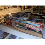 A LARGE AMOUNT OF PAPERBACK NOVELS ALL WAR RELATED PLUS WAR IN THE AIR MAGAZINES