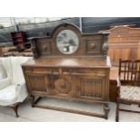 AN EARLY 20TH CENTURY OAK MIRROR BACK SIDEBOARD