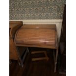 A CHILD'S PINE ROLL TOP DESK