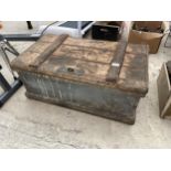 A VINTAGE PAINTED PINE STORAGE TRUNK WITH PADLOCK CLASP
