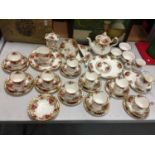 A LARGE COLLECTION OF MAINLY ROYAL ALBERT 'OLD COUNTRY ROSES' TO INCLUDE TEA POT, TRIO'S, SUGAR