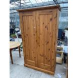 A PINE TWO DOOR WARDROBE, 47" WIDE