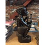 A TREEN TRIBAL ART FIGURINE