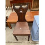 A 19TH CENTURY MAHOGANY HALL CHAIR WITH CRESCENT SHAPED TOP