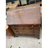 A GEORGE III OAK BUREAU WITH FOUR GRADUATED DRAWERS, FITTED INTERIOR AND BRACKET FEET, 36.5" WIDE