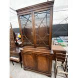 A GEORGIAN STYLE MAHOGANY ASTRAGAL GLAZED TWO DOOR BOOKCASE ON BASE, 39" WIDE