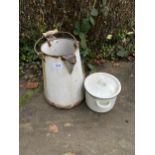 A LARGE ENAMEL WASH JUG AND A FURTHER ENAMEL LIDDED POT