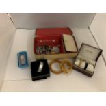 A JEWELLERY BOX CONTAING AN AMOUNT OF COSTUME JEWELLERY TO INCLUDE WATCHES, BRACELETS NECKLACES,