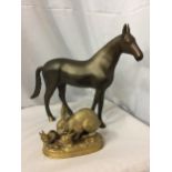A HEAVY BRONZE EFFECT METAL HORSE FIGURINE, HEIGHT 30CM, WIDTH APPROX 41CM, TOGETHER WITH A BRASS