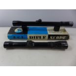 A BOXED A.S.I. 4 X 20 TELESCOPIC SIGHT AND A OIGEE LUXOR 2 3/4 X 90 SIGHT (2)