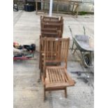 A GROUP OF SIX TEAK FOLDING GARDEN CHAIRS TO INCLUDE TWO CARVERS