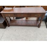 AN OAK 18TH CENTURY STYLE DRESSER ENCLOSING THREE DRAWERS AND POT BOARD, 60" WIDE