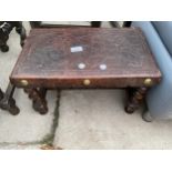 AN EARLY 20TH CENTURY OAK STOOL WITH LEATHER TOP AND BARLEYTWIST LEGS