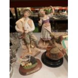 FOUR FIGURINES TO INCLUDE A CONTINENTAL STYLE BOY AND GIRL, AN ASIAN MUSICAL LADY ON A STAND AND A