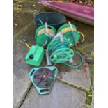 FOUR HOSE REELS, PLASTIC FEED BUCKET ETC