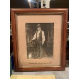 A VINTAGE FRAMED PHOTOGRAPH OF A WOODCUTTER, STAFFORDSHIRE 1890