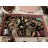 A LARGE BOX OF BANGLES AND BRACELETS