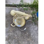 A RETRO CREAM PUSH BUTTON TELEPHONE