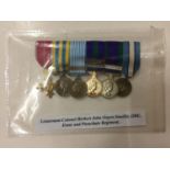 A MINIATURE MEDAL GROUP AWARDED TO LIEUTENANT COLONEL HERBERT JOHN ORPEN-SMELLIE O.B.E. OF THE ESSEX