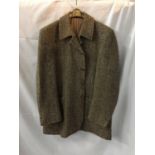 A PURE NEW WOOL, TWEED JACKET MADE BY HECTOR POWE, REGENT STREET, LONDON