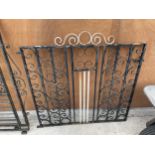 A DECORATIVE WROUGHT IRON GARDEN GATE (H:105CM W:106CM)