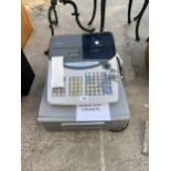 A CASIO TE-2000 CASH REGISTER WITH KEYS BELIEVED IN WORKING ORDER BUT NO WARRANTY