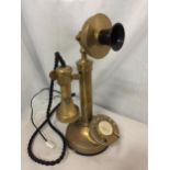 A BRASS CANDLESTICK TELEPHONE