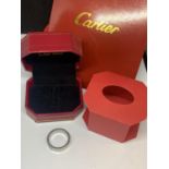 A FASHION 'LOVE' RING SIZE P WITH A PRESENTATION BOX AND BAG