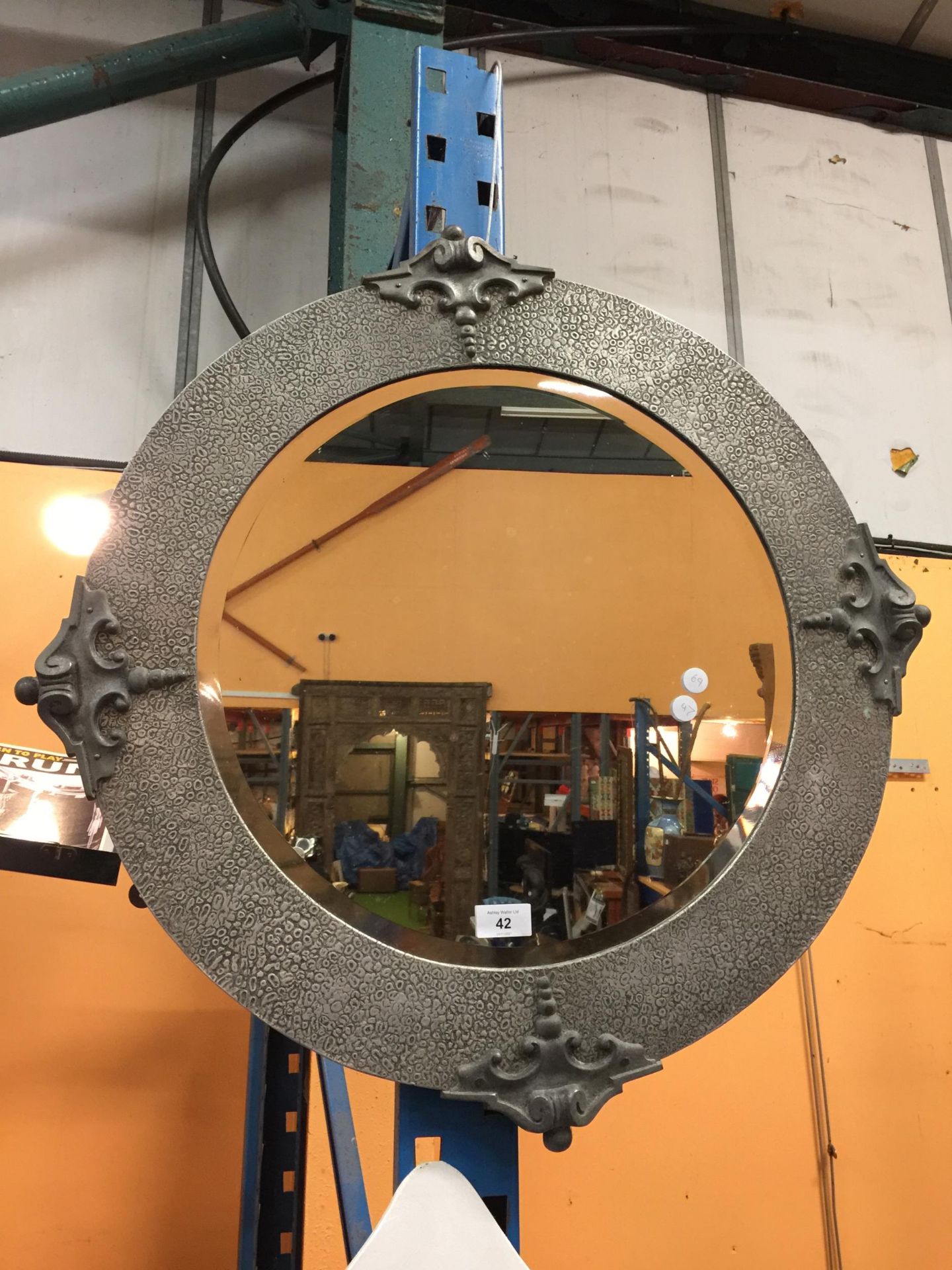 A PEWTER ARTS & CRAFTS CIRCULAR MIRROR WITH BEVEL EDGE, DIAMETER APPROX 72CM