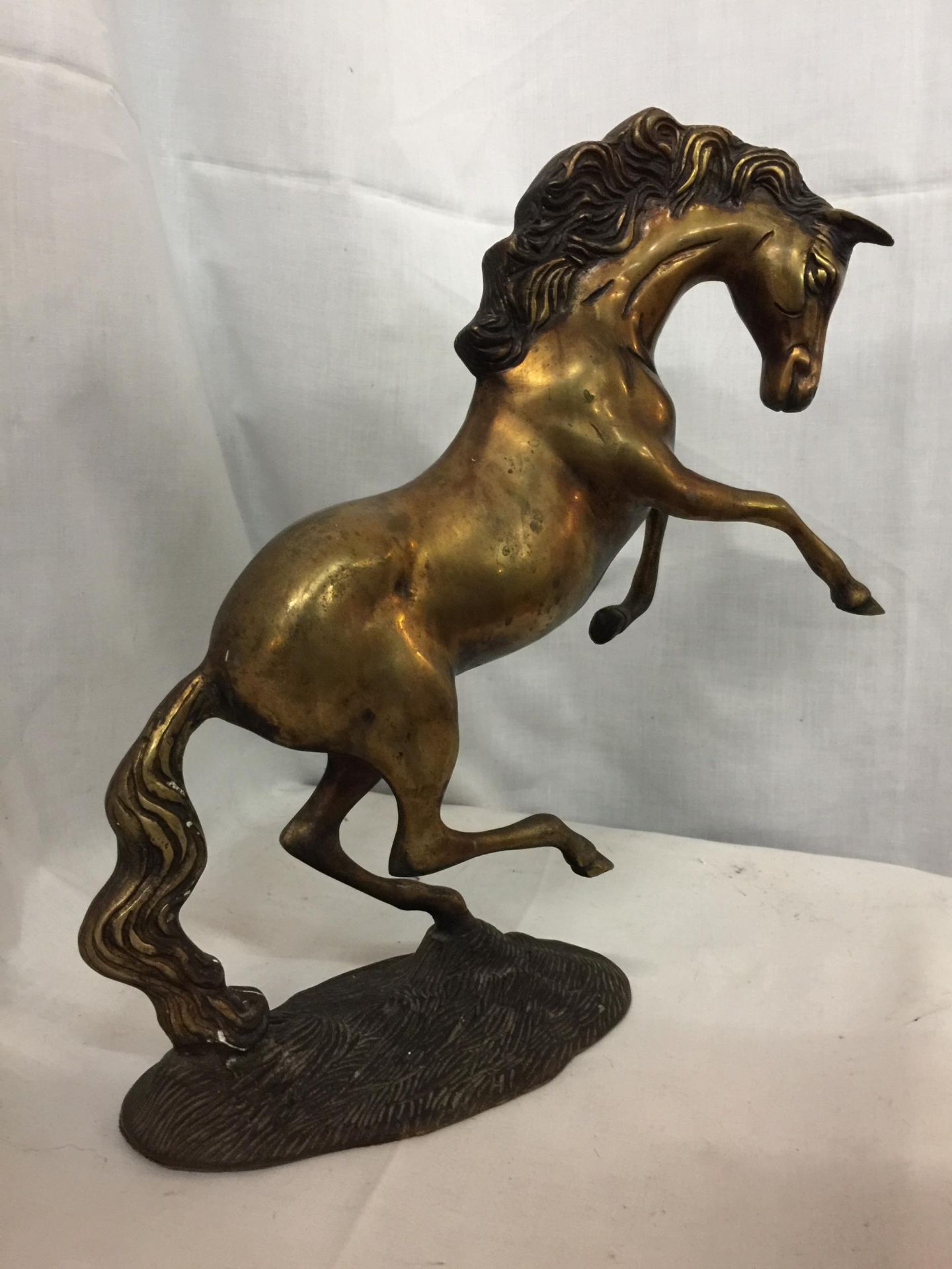 A BRASS REARING HORSE ORNAMENT, HEIGHT 30CM
